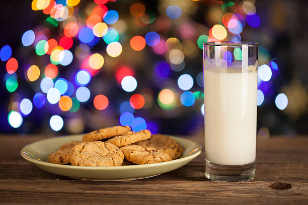 Gingerbread stars cookies and Milk for Santa Claus Gingerbread stars cookies and Milk for Santa Claus. Christmas Tree Cookie stock pictures, royalty-free photos & images
