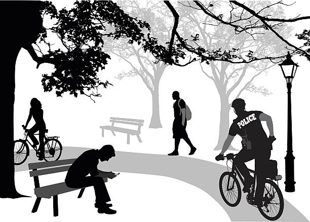 polizei rad im park - bench park park bench silhouette stock-grafiken, -clipart, -cartoons und -symbole