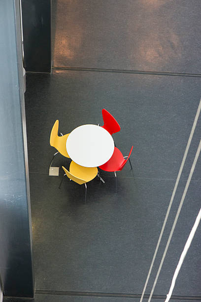 istock High Angle View Of Chairs And Tables Arranged In Cafe 618955978