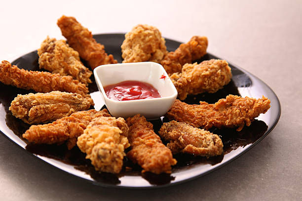 istock Grilled chicken on a plate standing the wooden table 618956042