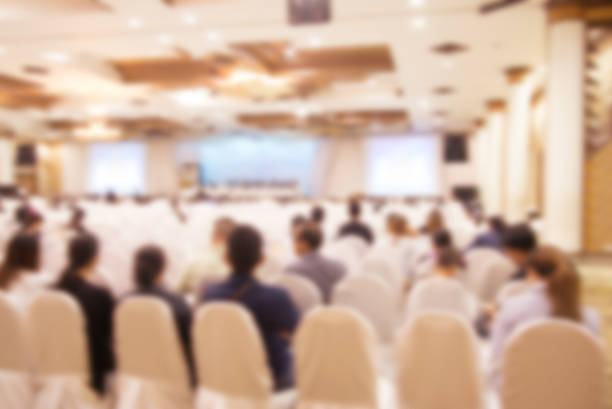 istock blurred Business Meeting. Audience in the conference hall. 618956948