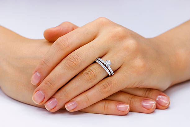 istock Close up of female hands with ring 618960926