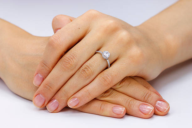 istock Close up of female hands with ring 618962066