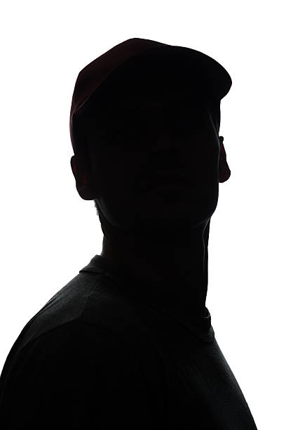 istock Portrait of a young man in cap, front view 618965308
