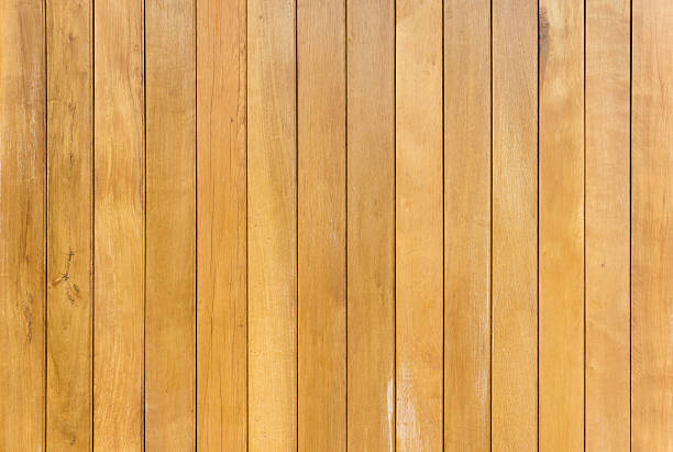 istock yellow wooden fence background 618966230