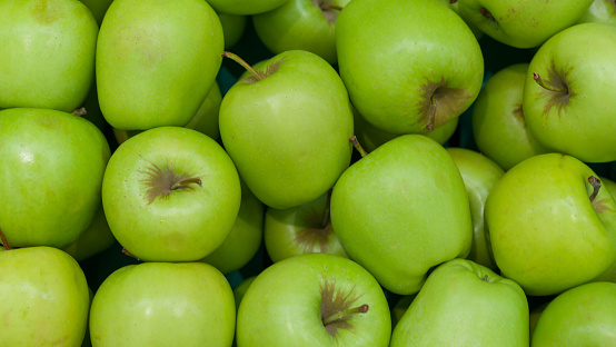 gree Apples in market  close up