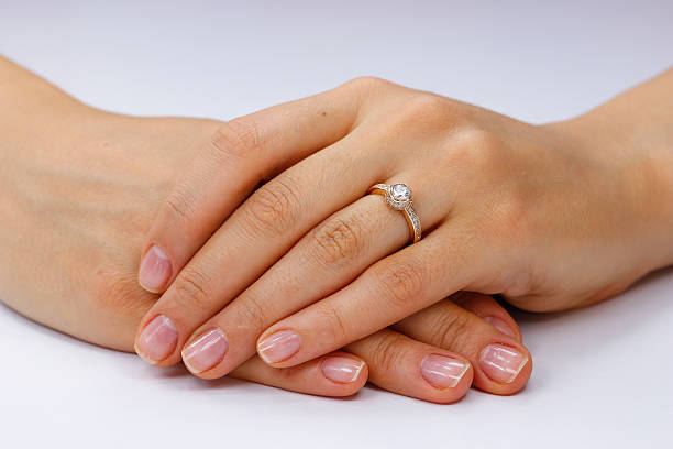istock Close up of female hands with ring 618969826