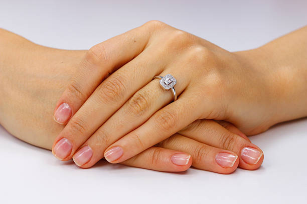 istock Close up of female hands with ring 618971226