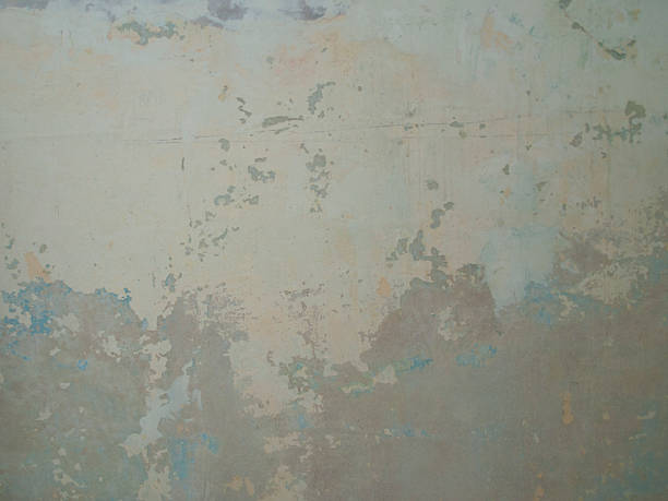 pared antigua con capas de pintura y yeso - lead paint fotografías e imágenes de stock