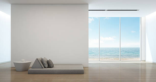 istock Bed in sea view interior of modern beach house 618974706