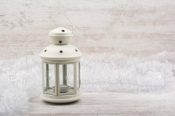 istock Christmas lantern on white wooden background 618978168