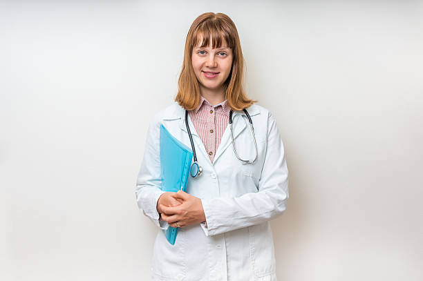 istock Young doctor with stethoscope and clipboard 618980738