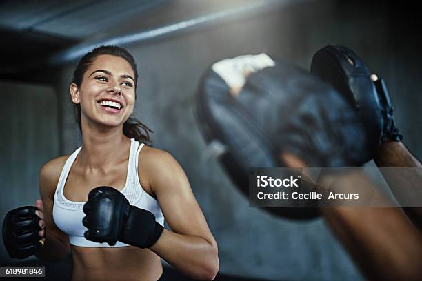 Boxing Her Way To A Ripper Body Stock Photo - Download Image Now - Boxing - Sport, Exercising, Gym