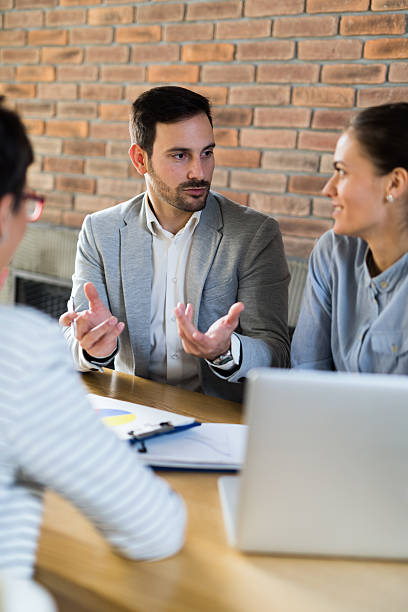 istock Business people discussing financial data during business meeting 618982324