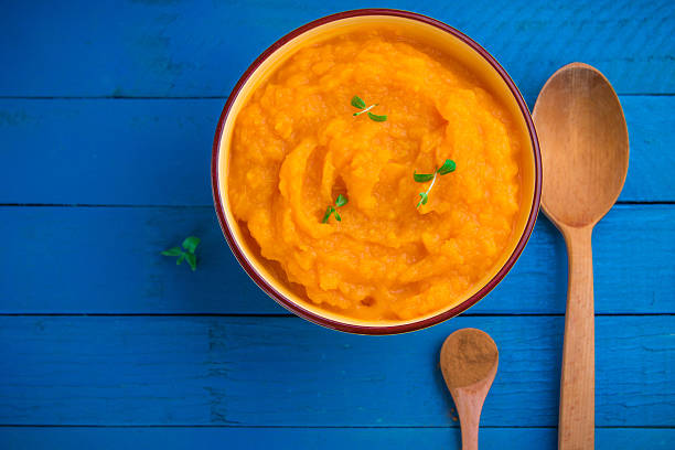 istock Pumpkin cream soup in bowl 619043948