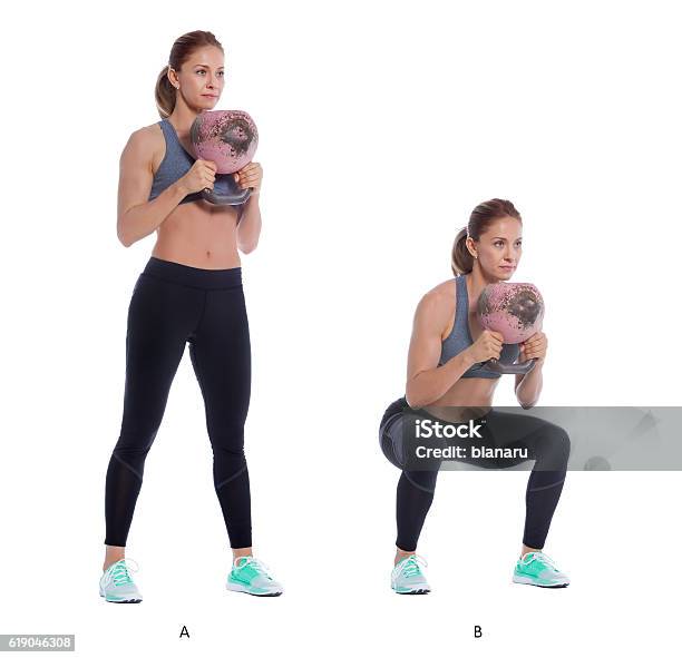 Kettlebell Front Squat Stock Photo - Download Image Now - Kettlebell, Front View, Squatting Position