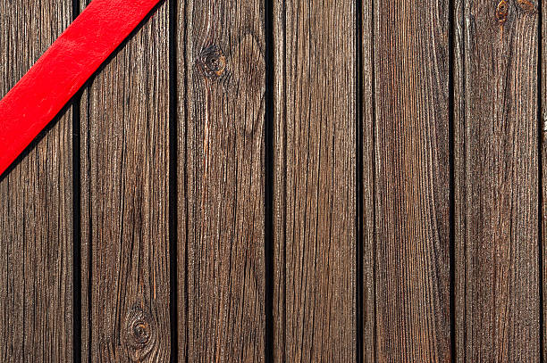 istock Wooden planks and red metal board 619046502