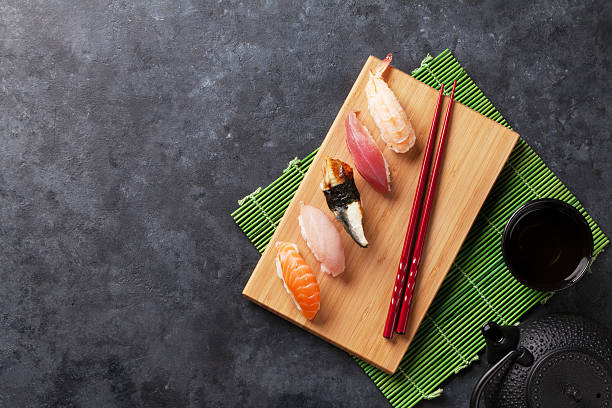 istock Set of sushi and green tea 619046586