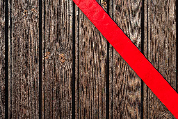 istock Wooden planks and red metal board 619046908