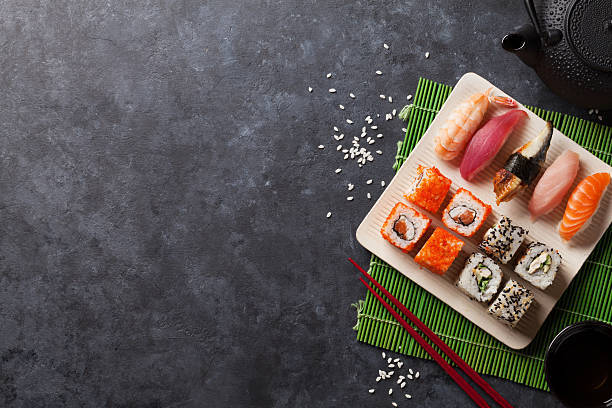 istock Set of sushi, maki and green tea 619047150