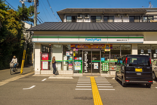 Kyoto, Japan - October 24, 2016: A FamilyMart store in Arashiyama. FamilyMart is Japan's third largest convenience store (or conbini) chain.