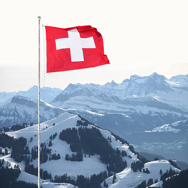 istock Swiss flag Alps mountains 619048690