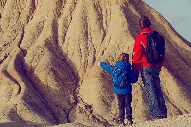 istock father and son travel in scenic mountains 619048938