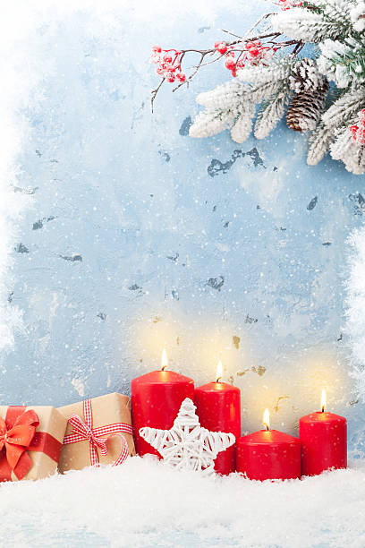 istock Christmas candles, gifts and fir tree 619049064