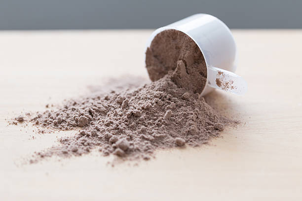 istock Scoop of chocolate whey protein 619054922
