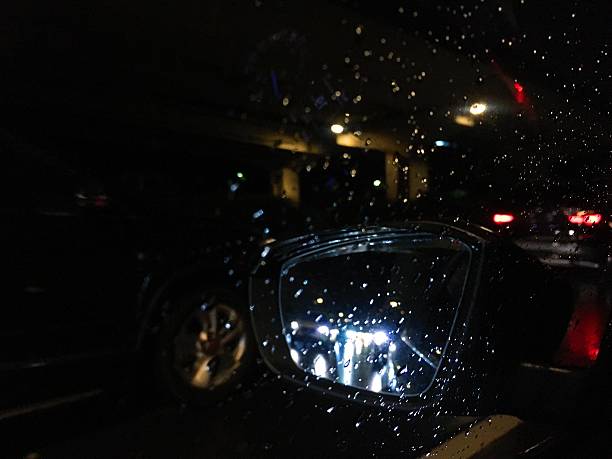istock Raindrops on the car rearview mirror. 619054966