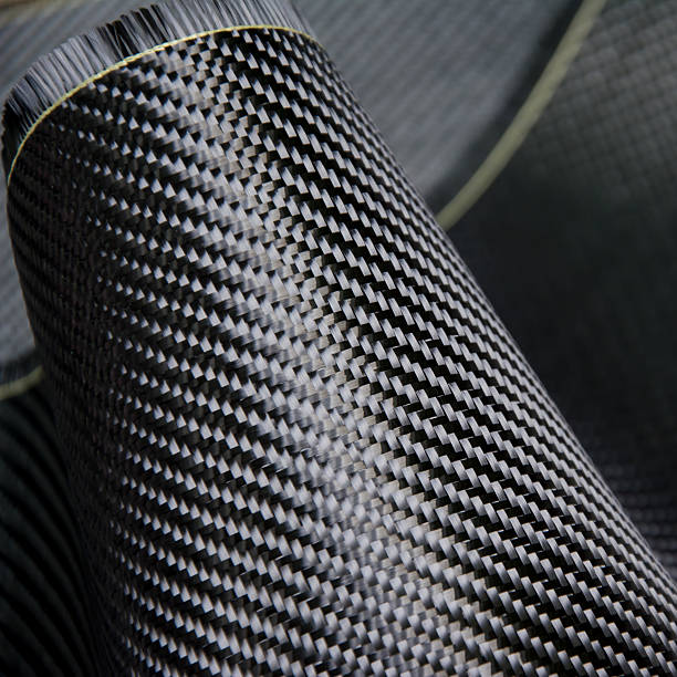 istock Carbon fiber composite material background 619055118