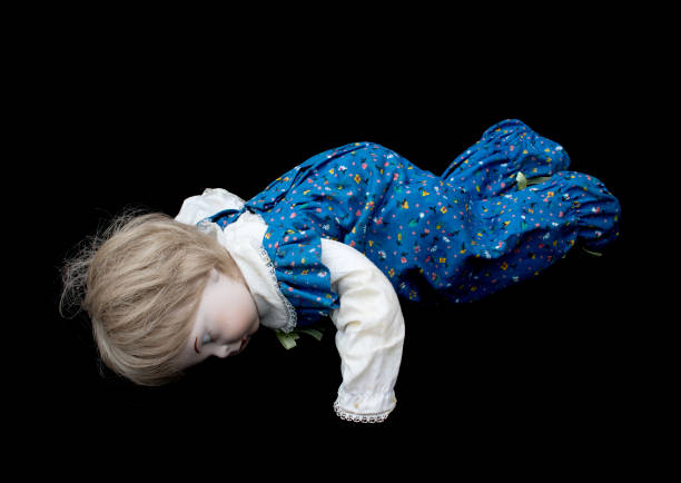 istock Close Up and Isolated Vintage Antique Old Doll 619055196
