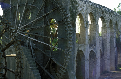 a traditional norias wooden water wheelsl in the city of Hama in Syria in the middle east