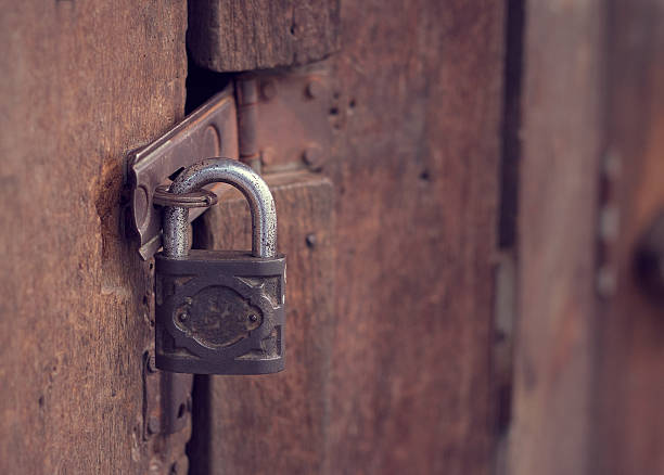 istock Old wooden door with key lock (Vintage style) 619057680