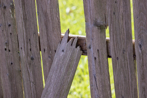 rustic broken wooden fence close up