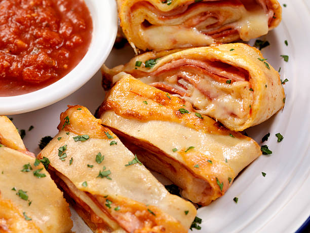 stromboli mit pepperoni und schinken und salami - pizza pastry crust stuffed cheese stock-fotos und bilder