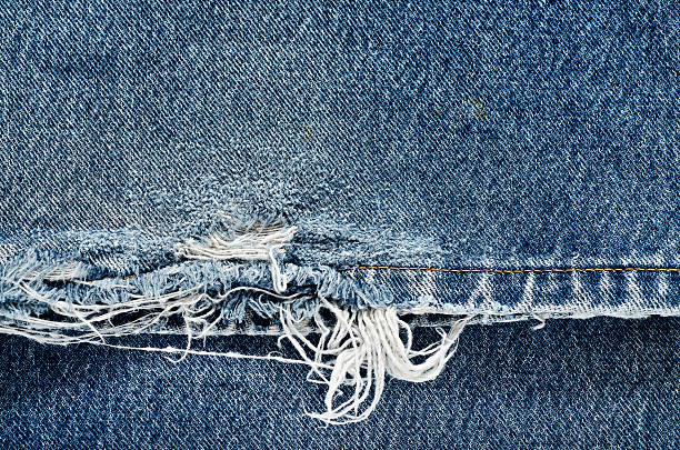 istock .Denim jeans texture or denim jeans background with old torn. 619059018