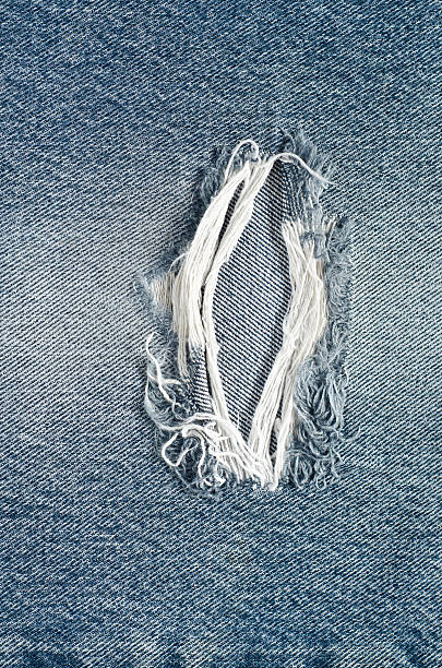 istock .Denim jeans texture or denim jeans background with old torn. 619059710