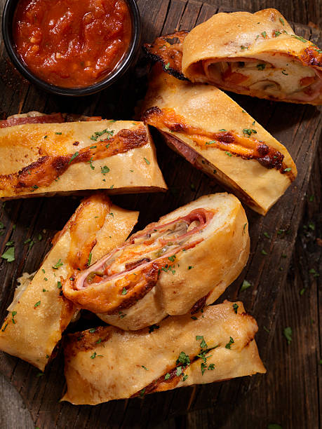 istock Stromboli with Pepperoni, Salami, Mushrooms and Peppers 619059734