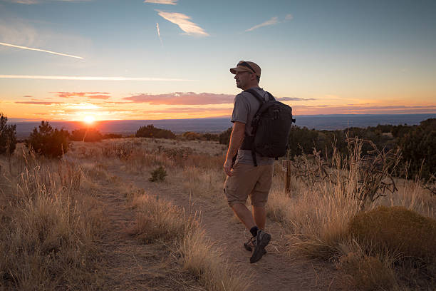 istock man hiking nature landscape 619060274