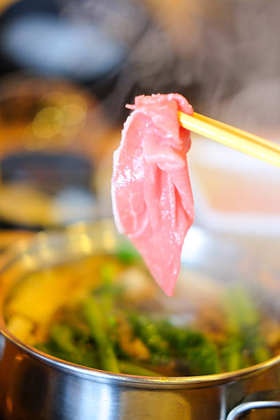 istock selective focus on shashu pork for suki shabu 619061200