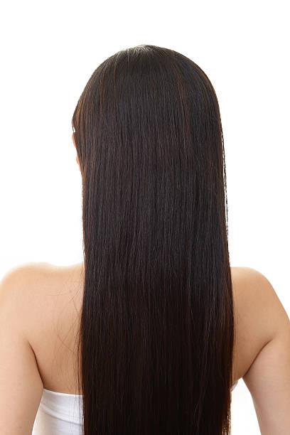 istock Back of young woman 619061380
