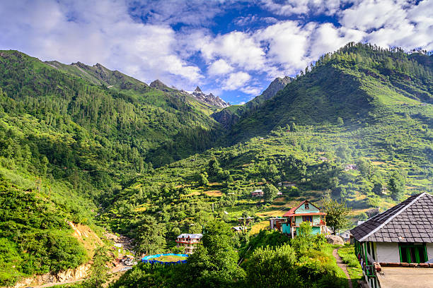 istock Village in himalayan footills covered with trees. 619061656