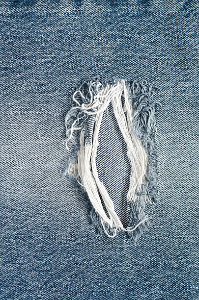 istock .Denim jeans texture or denim jeans background with old torn. 619062104