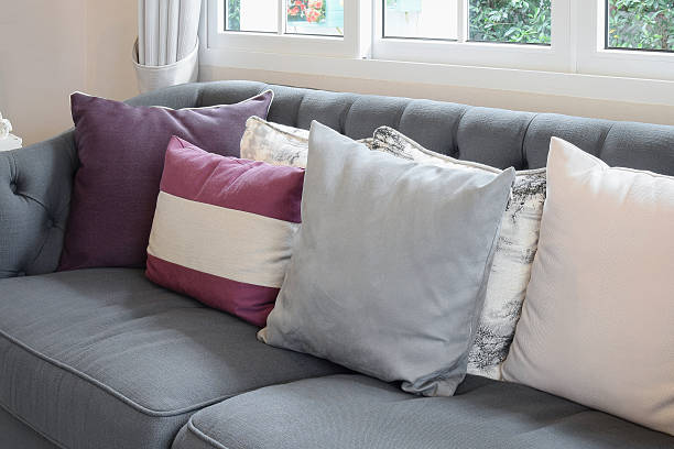istock luxury living room design with classic sofa and colorful pillows 619062644