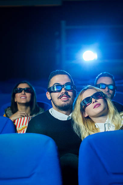 istock Loving couple at the cinema 619064422
