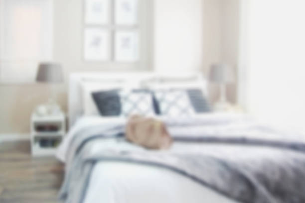 White pillows in hotel bedroom.