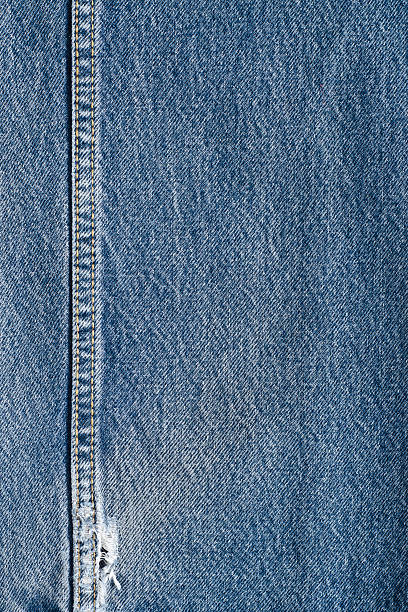 istock .Denim jeans texture or denim jeans background with old torn. 619065040