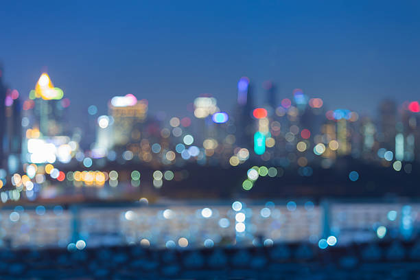 istock Blurred lights city downtown with clear blue sky 619066176