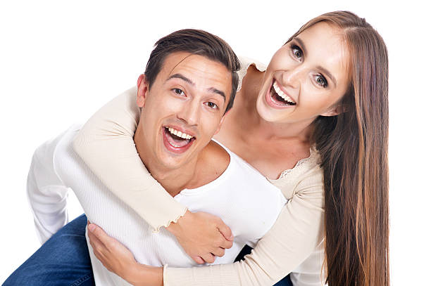 istock Happy young couple embracing 619067372